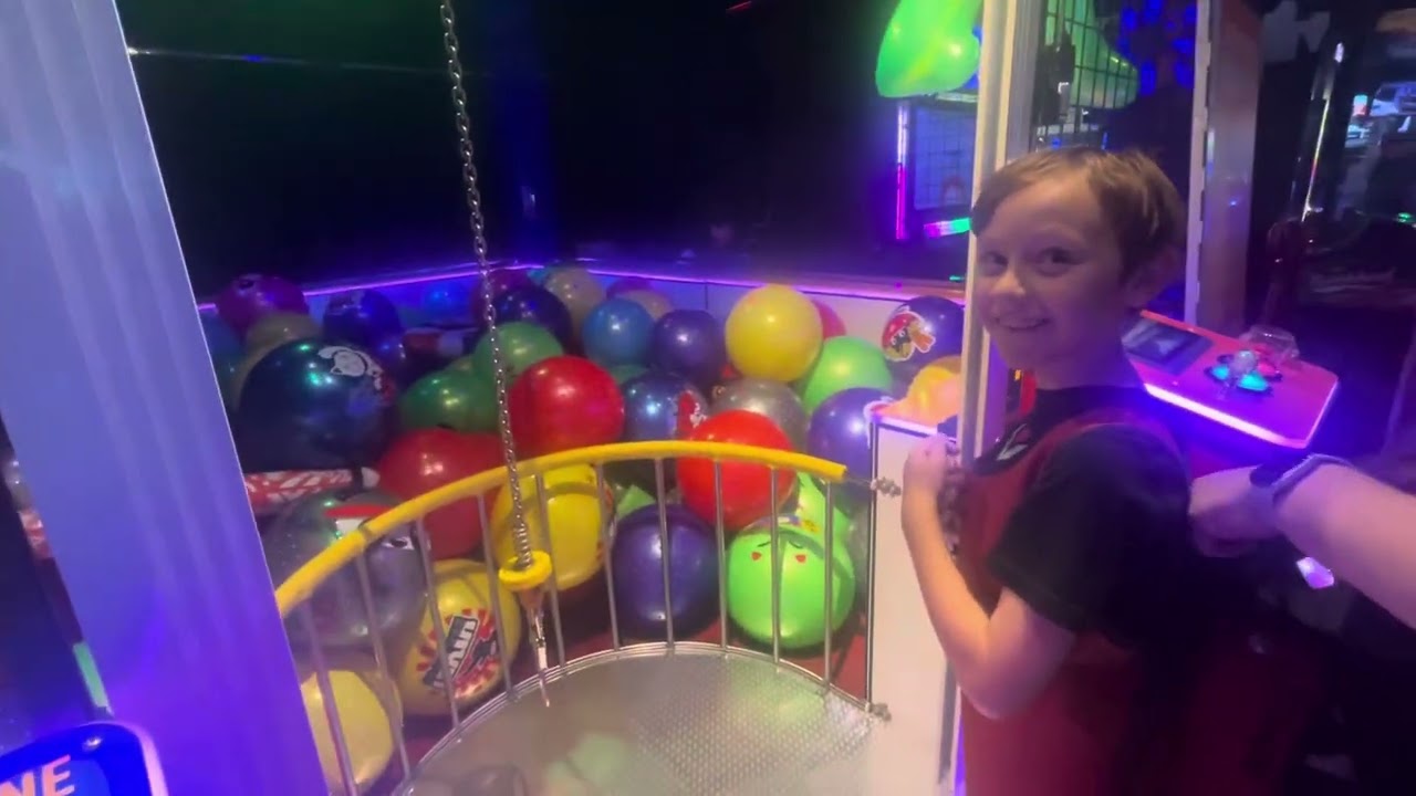 Dave & Busters Human Claw. Axl living his dream as a human claw #daveandbusters #clawmachine #funny