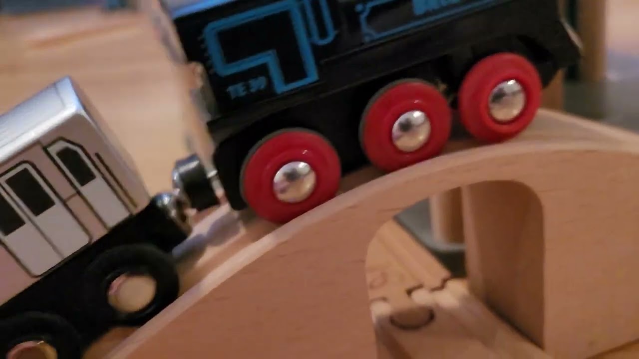 Toy Toronto Transit Commission subway on toy train tracks