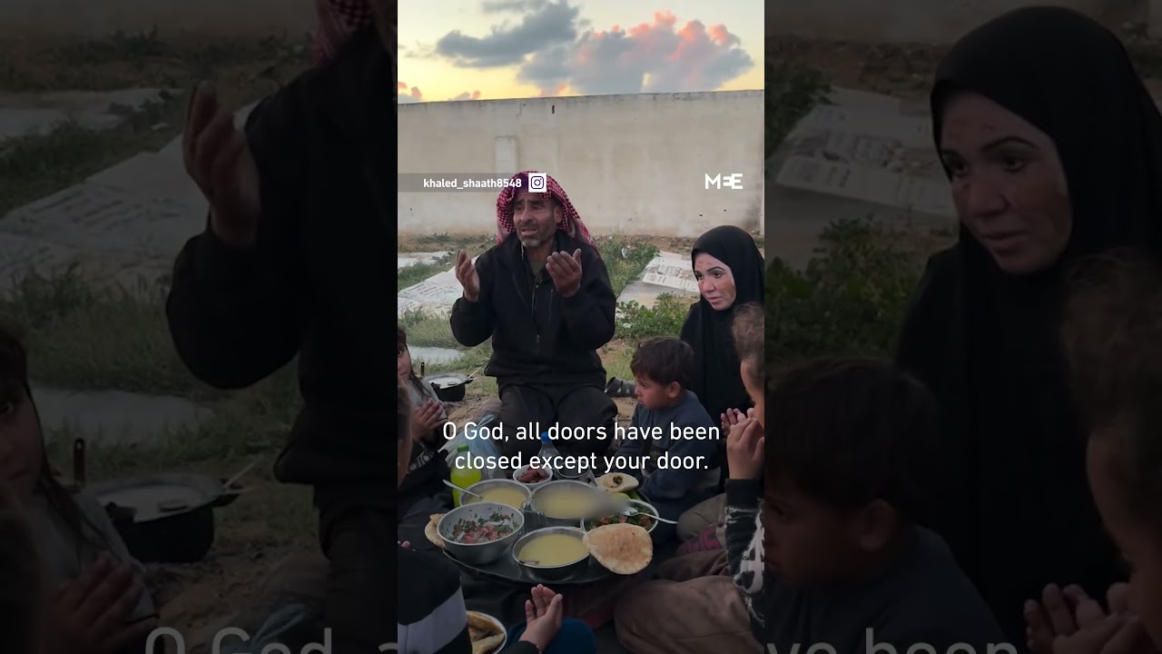 Displaced Palestinian family breaks fast at cemetery in Gaza