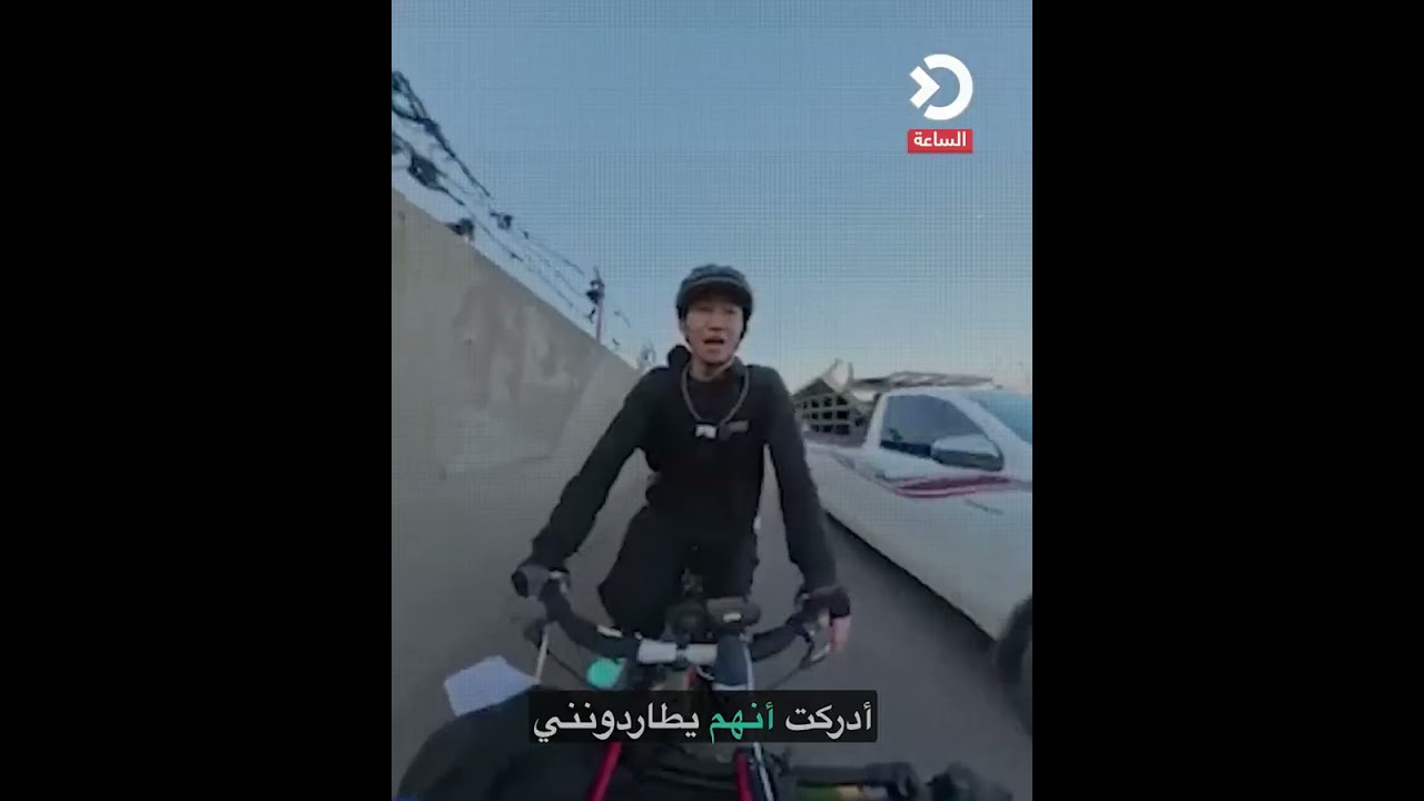 أشخاص يطاردون سائحا يابانيا لتسليبه في بغداد