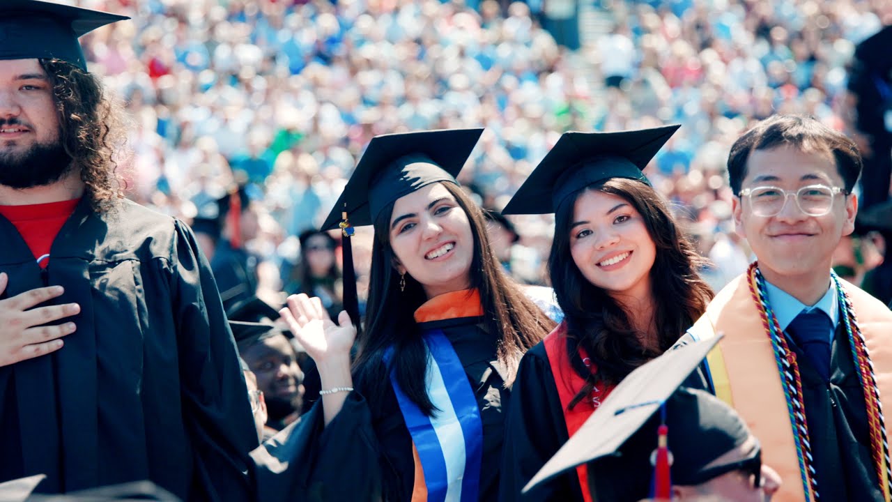 KU Engineering students celebrate a walk down the Hill for KU Commencement on May 18, 2025
