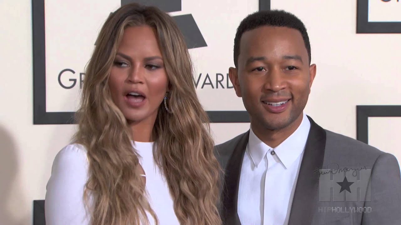 Chrissy Teigen Explodes On The Grammy Red Carpet! 