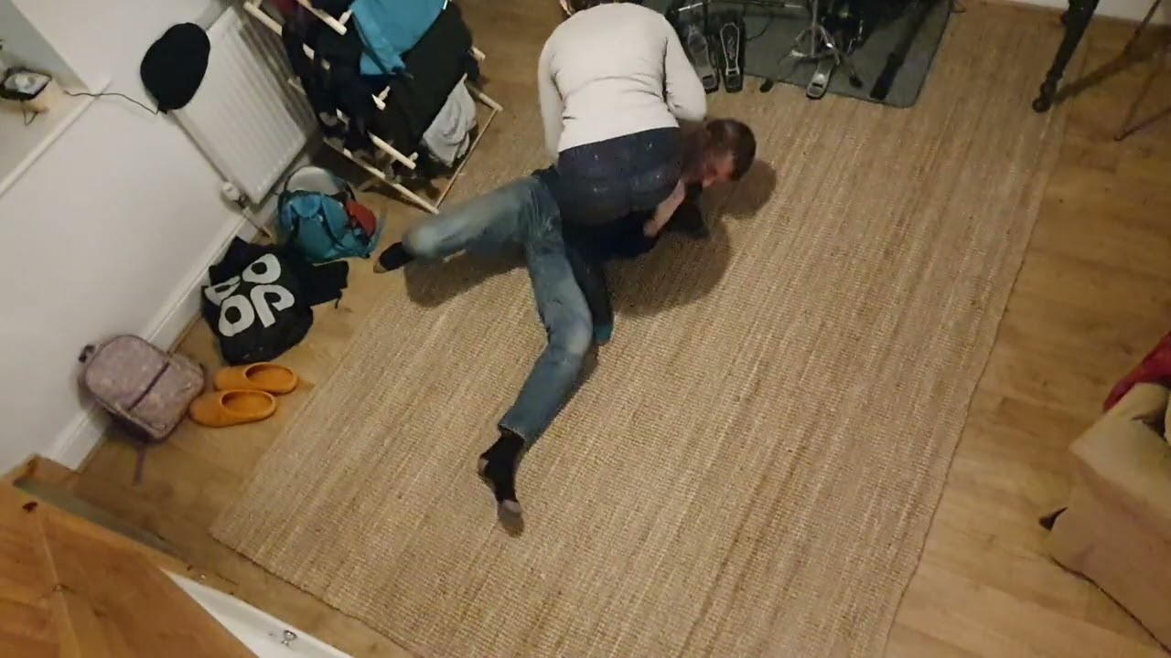 Evening aiki lab practice between dad and daughter
