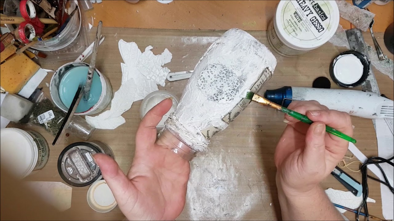 Altered bottle with Scary Alice Apothecary Labels