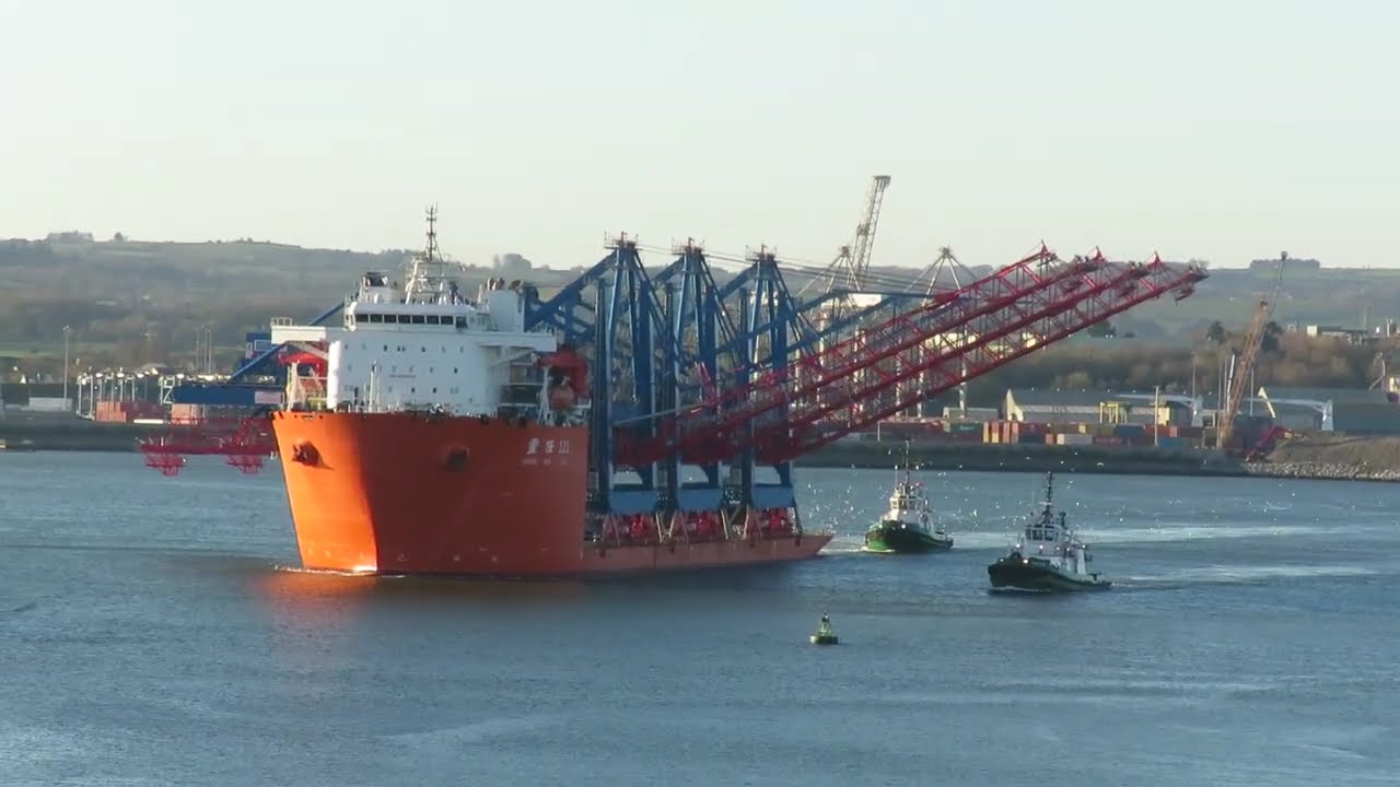 ZHONG REN 121 outbound from Cork Dockyard with 3 Liebherr ship-to-shore container cranes 09/12/2024.