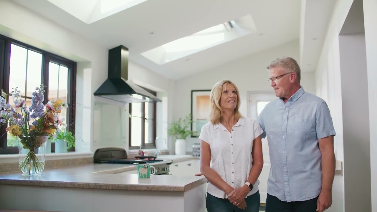 Jason and Angela's transformation of a dull kitchen with low pitch roof windows