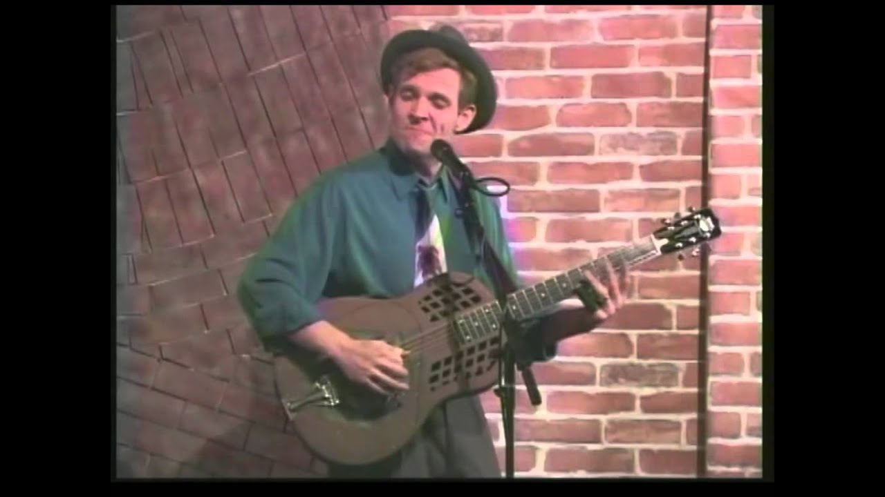 Catfish Keith in concert playing two song