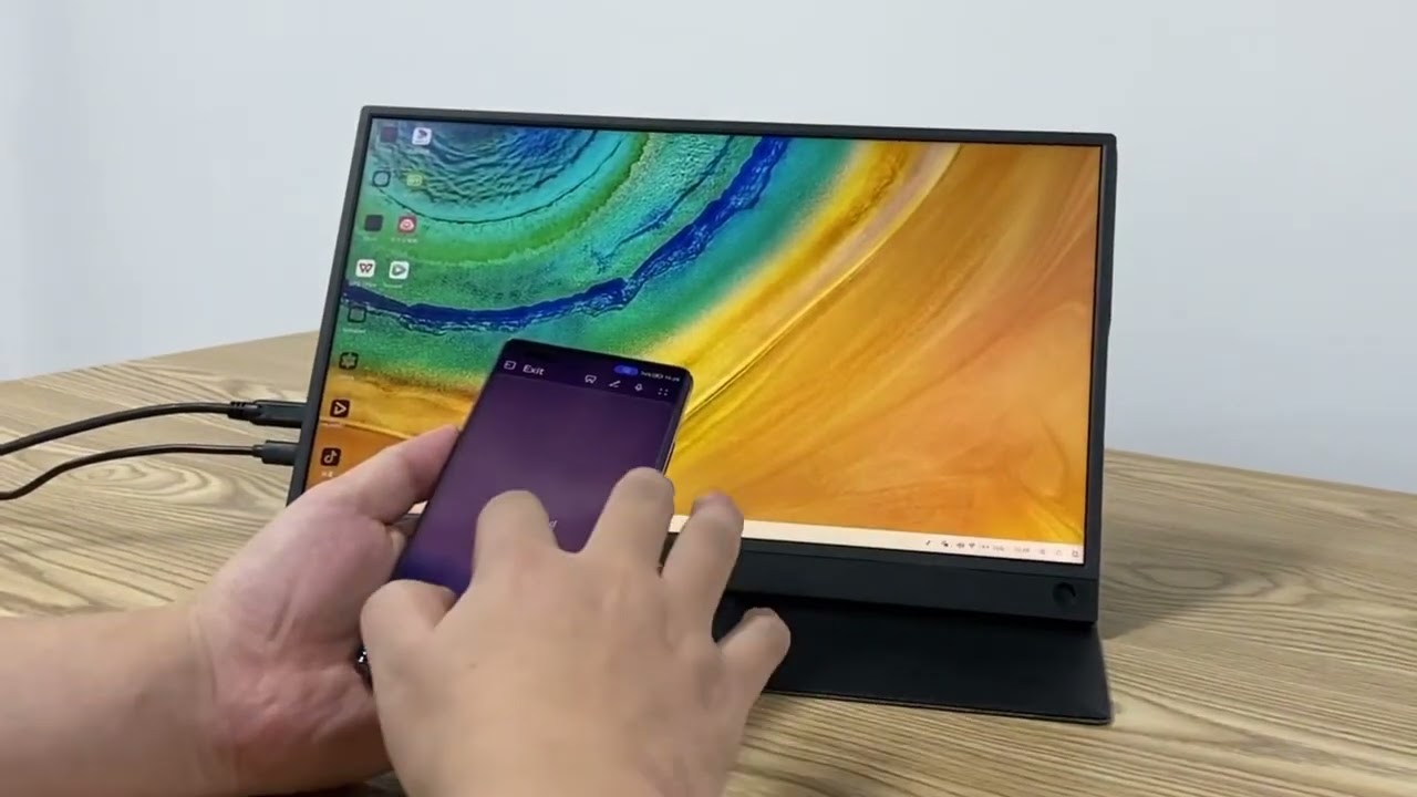 The ZEUSLAP-P15A is a 15.6-inch portable monitor featuring a Full HD IPS screen with a resolution