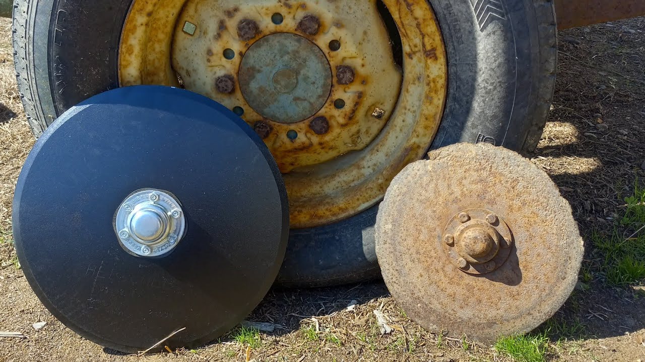 These sure don't look like PENNIES! John Deere 8200 Grain Drill Disc Opener's and hydraulic cylinder