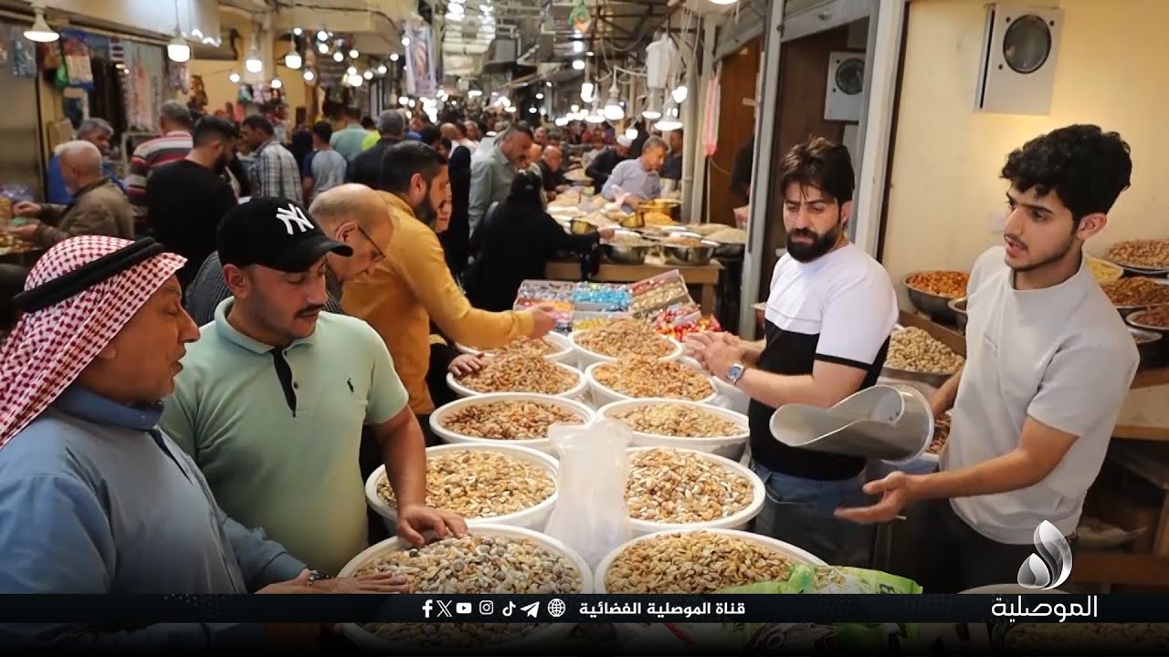 الموصلية ترصد الحركة التجارية والاقبال على محلات الكرزات والحلويات في سوق باب السراي
