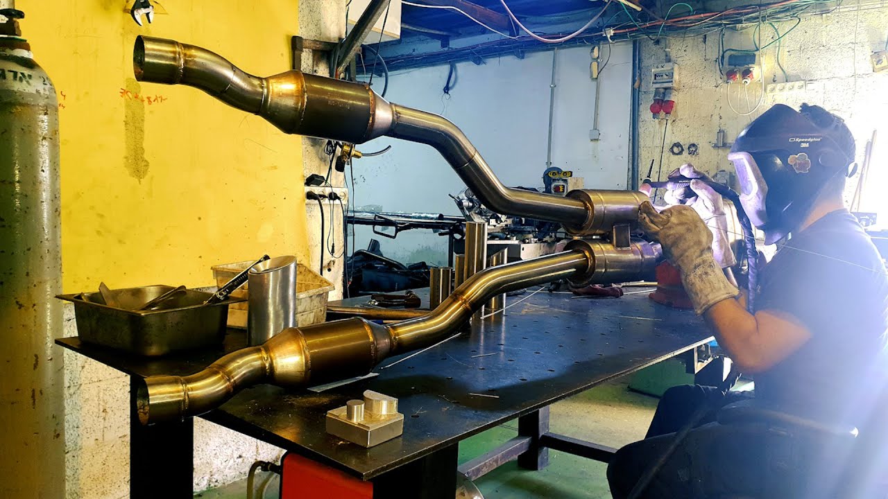 Subaru exhaust repair & tuning. H6 Raptor Supercharger + headers + HJS Sports Catalyst + STi GenNome