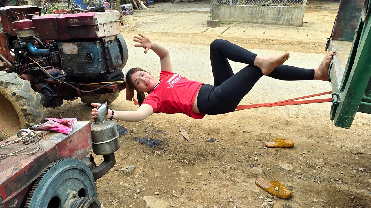 Talented girl: Rescues a tractor whose engine has stopped working.