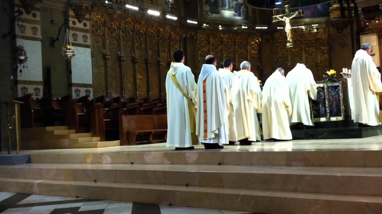 Monks beautiful  liturgic Santa Maria de Montserrat monastery Barcelona