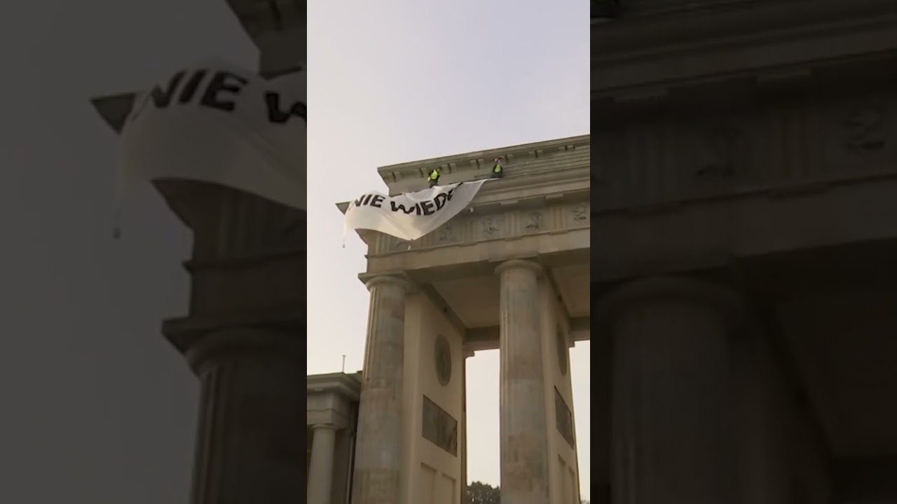 Pro-Palestinian protesters unfurl banner atop Berlin's Brandenburg Gate