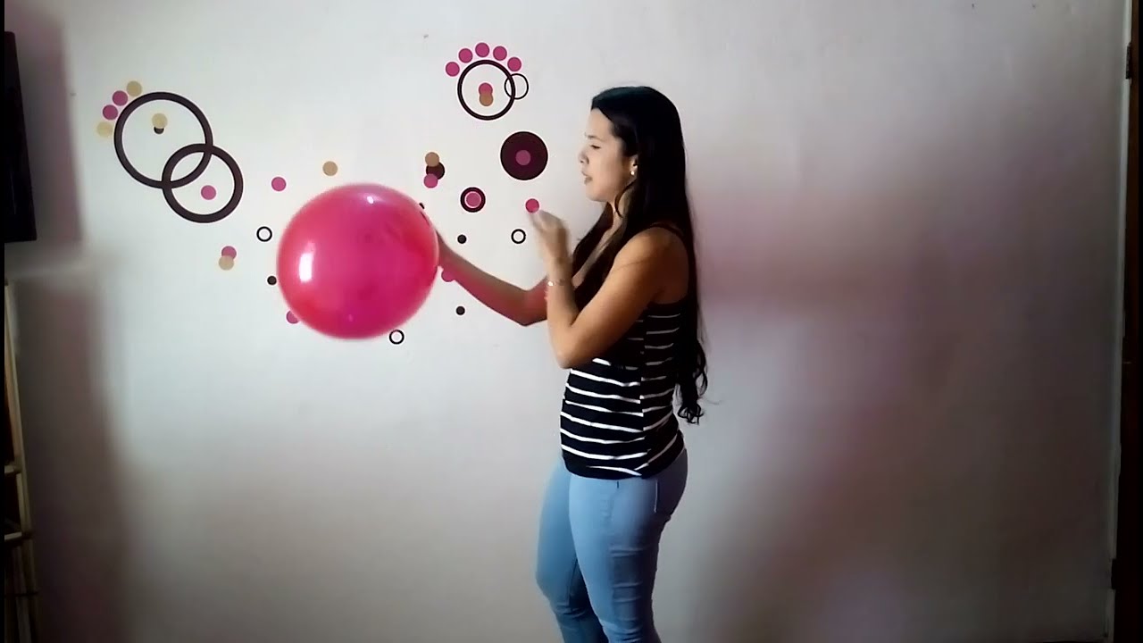 Blowing and bursting balloons her specialty