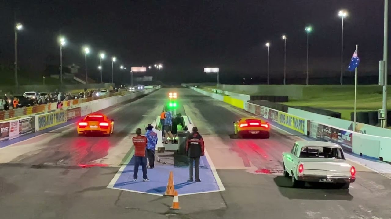 Green Lamborghini loses control at Calder Park versing R8