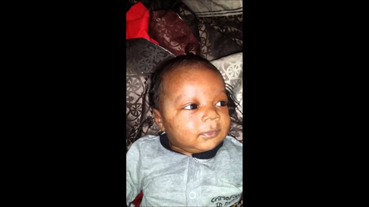 smiling and happy 7 weeks old baby