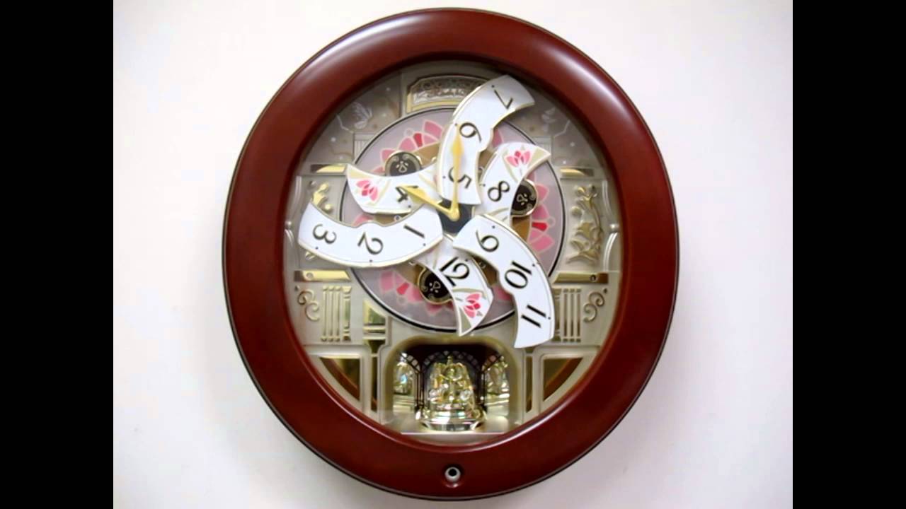 QXM360BRH Seiko Melodies in Motion Golden Grandeur Wall Clock