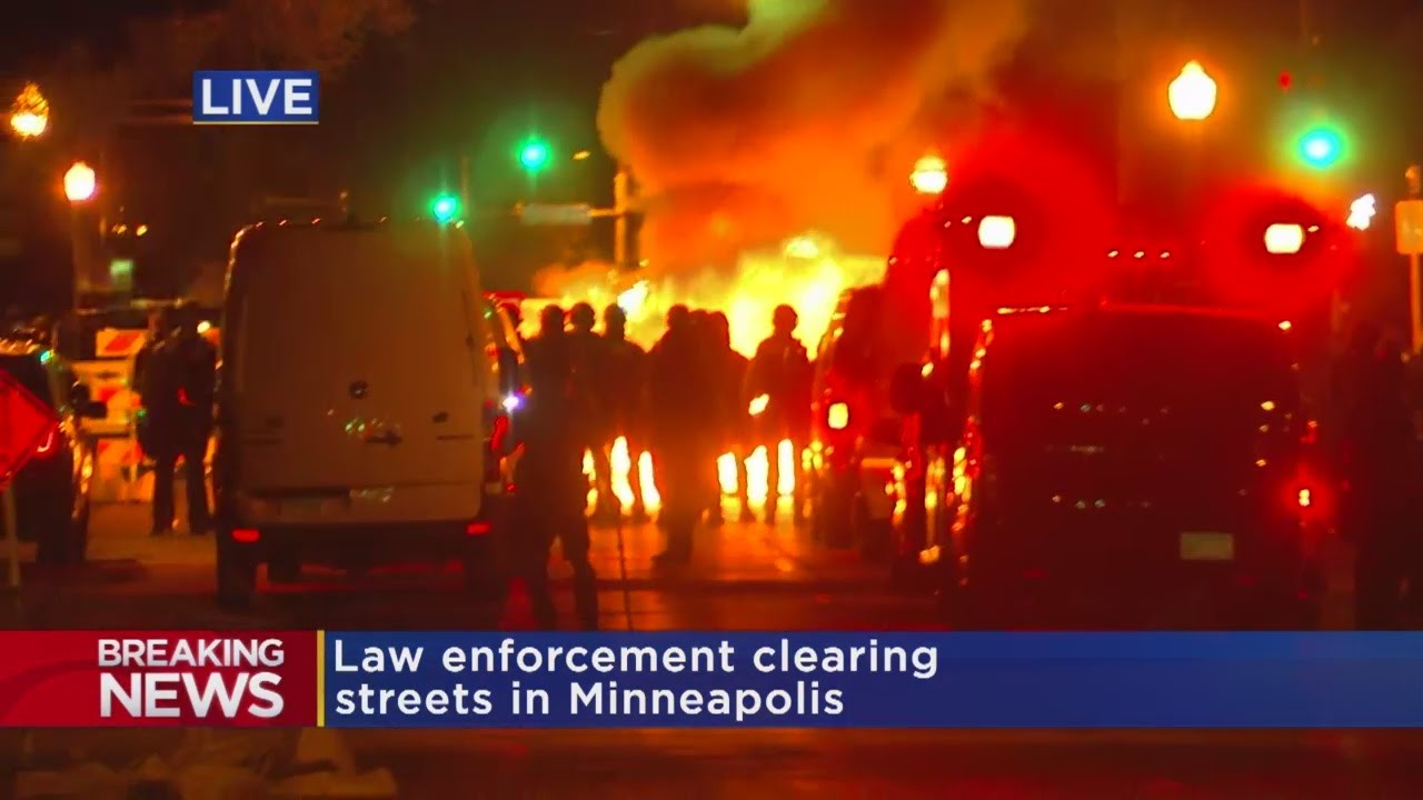 Law Enforcement Extinguishes Fire In South Minneapolis Intersection
