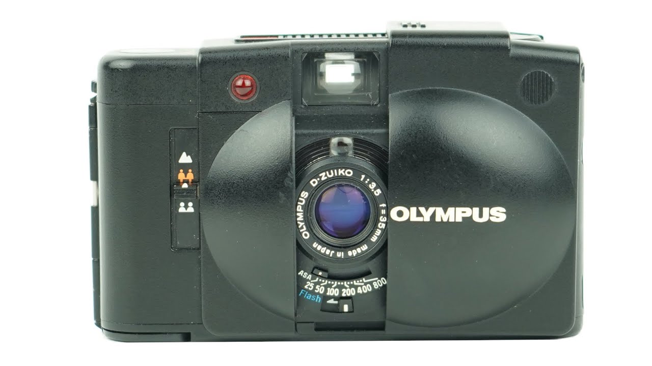 Как использовать 35-мм пленочную камеру Olympus XA2