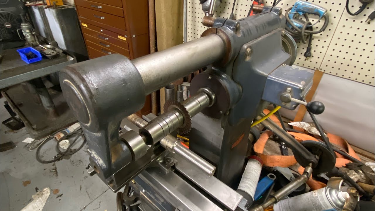 Freeing up the over arm support on the Burke milling machine