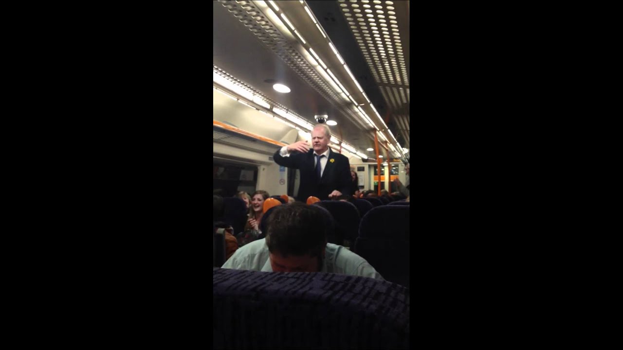 Drunk man singing on the train