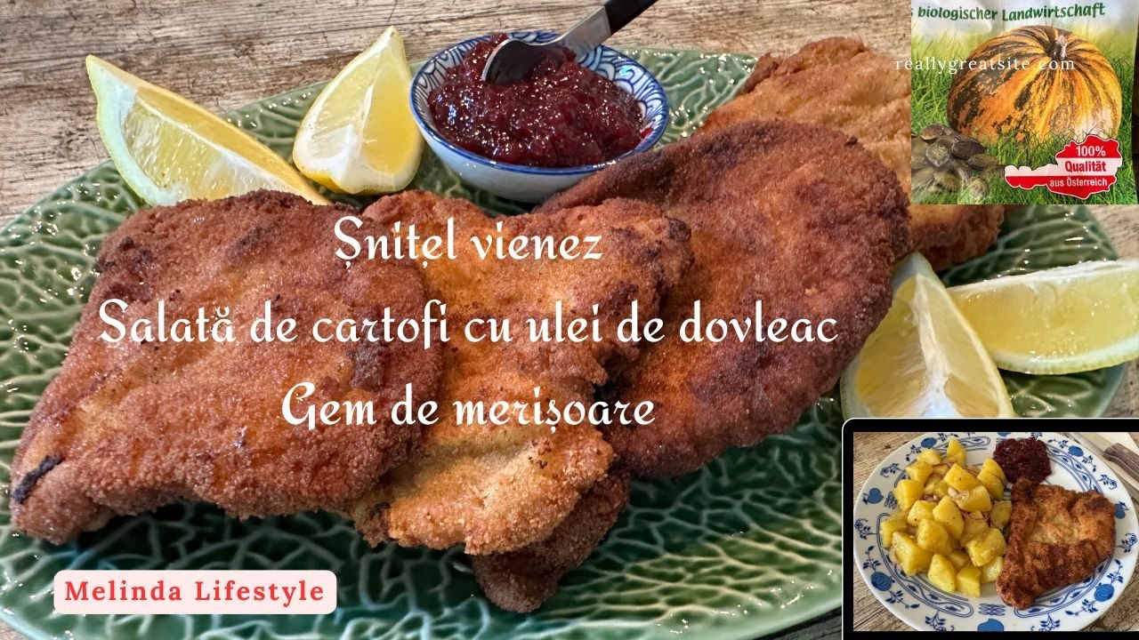 Snitel vienez, salata de cartofi cu ulei de dovleac. Gem de merisoare. Meniu autentic vienez.