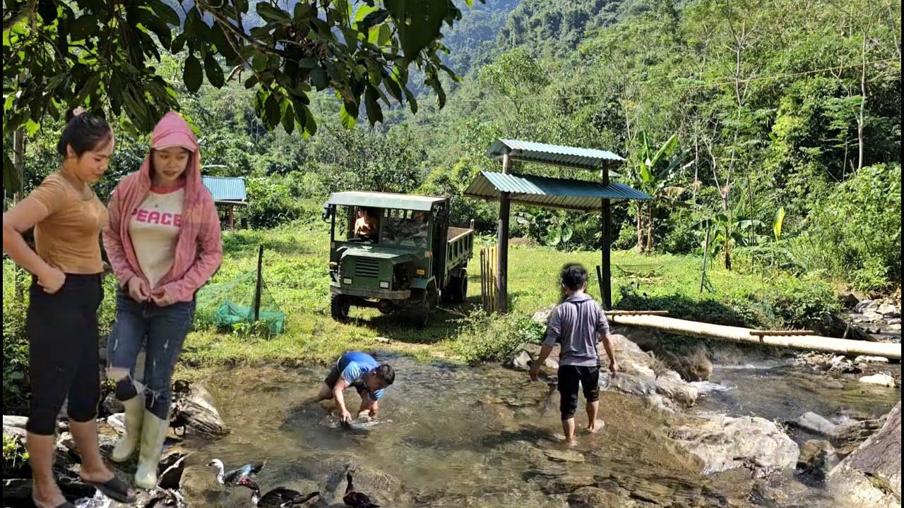 A day of excavators and trucks in the Vietnamese countryside.