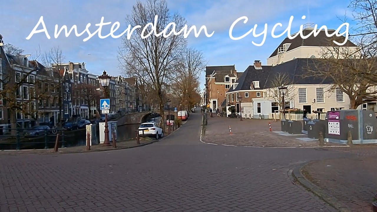 Amsterdam Cycling across Oost, Van Woustraat, the canal district and the crowded Warmoestraat.