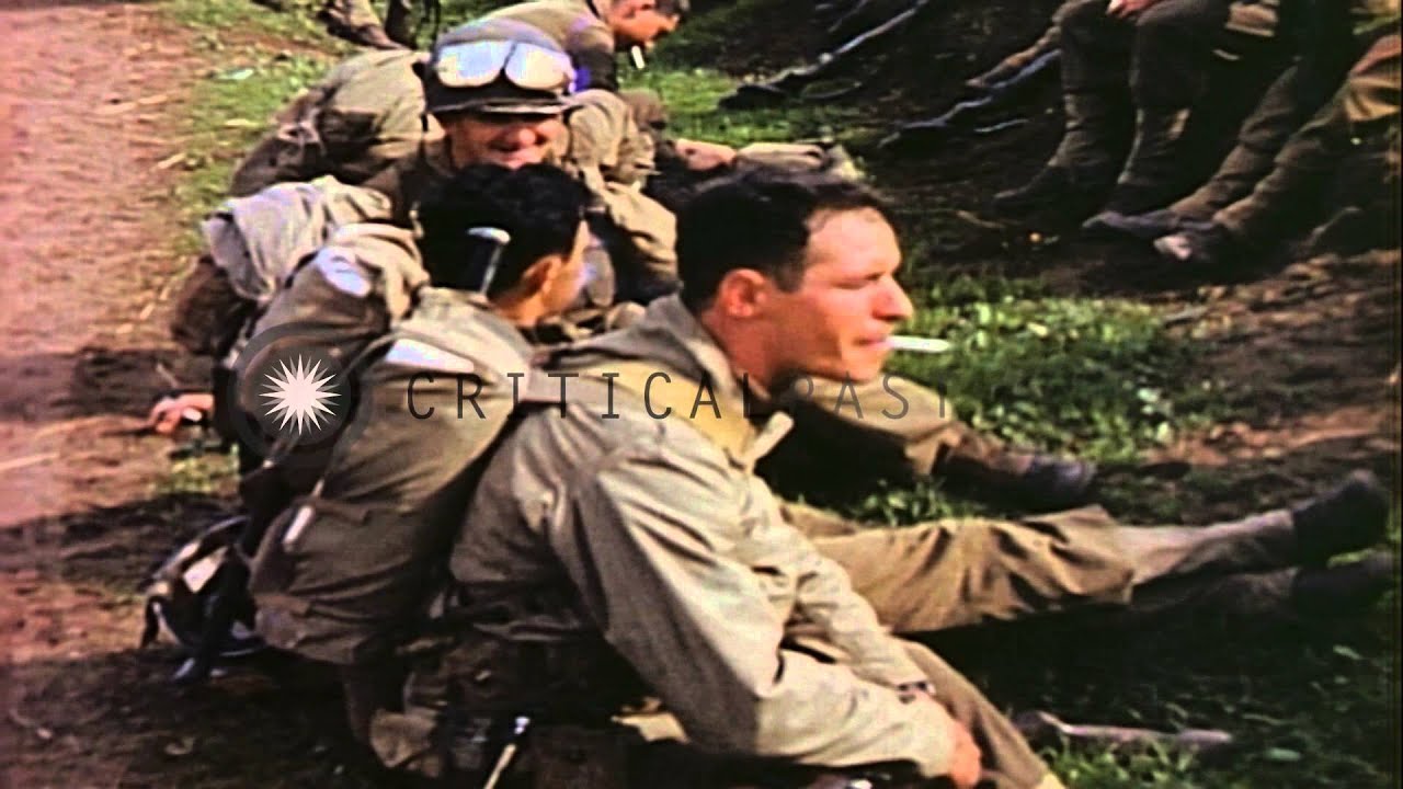 US 30th Infantry Regiment, 3rd Division, troops smoke and rest at side of a road ...HD Stock Footage