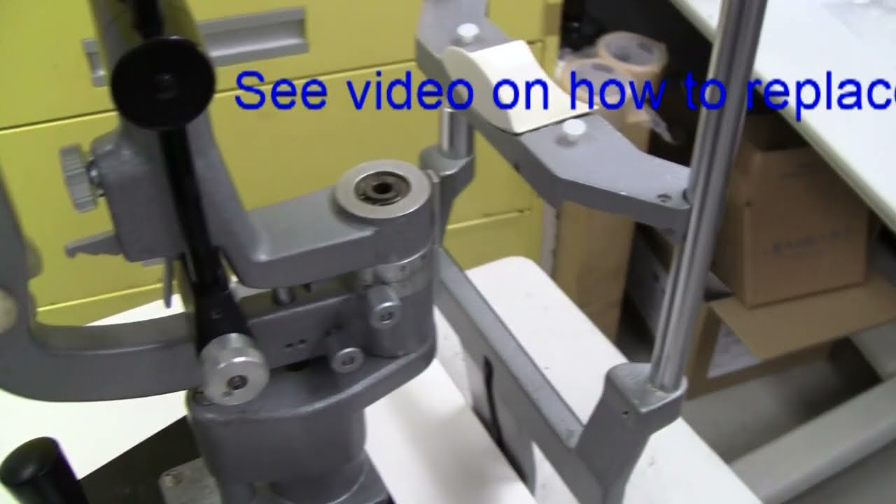 Haag-Streit 900BM Slit Lamp lowering/going down by itself. Downward inertia suppression.