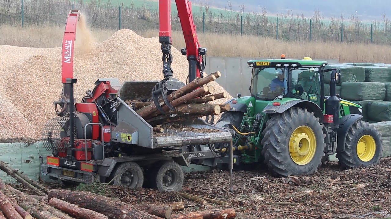John Deere 7310R Tractor, Chipping with Mus-Max 9XL Wood-Terminator.