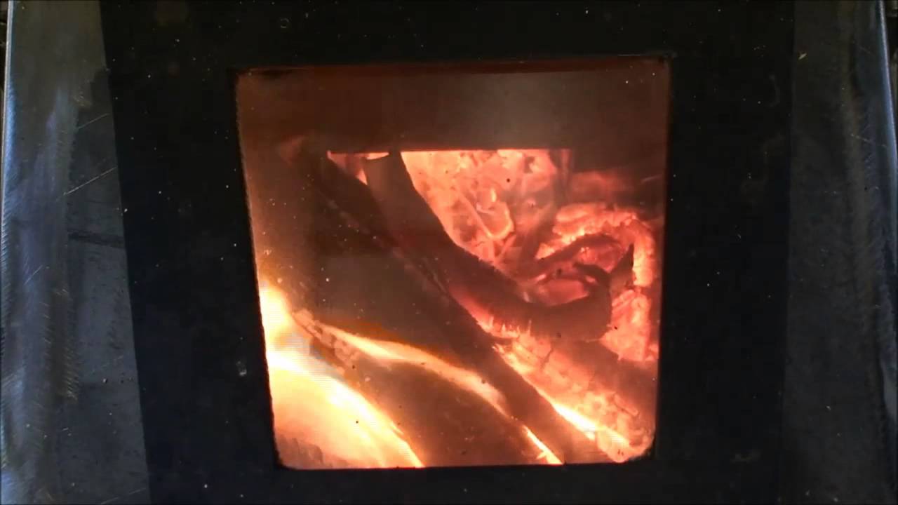 part 4 rocket stove mass heater finished and lit.