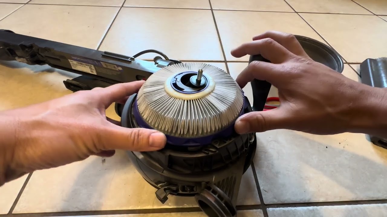 How to unclog and disassemble Dyson DC40 Ball Animal full repair fix clog hair removal troubleshoot