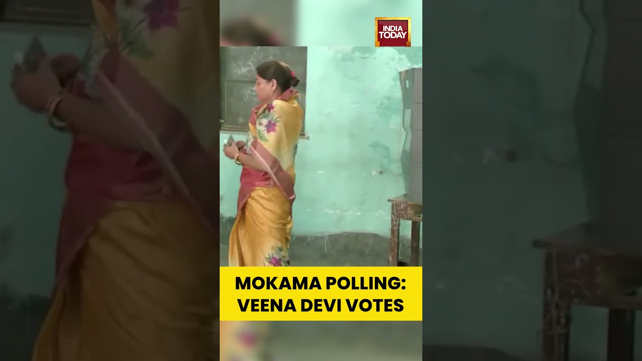 RJD candidate Veena Devi casts her vote at a polling booth in Mokama, Bihar Elections 2025 #bihar