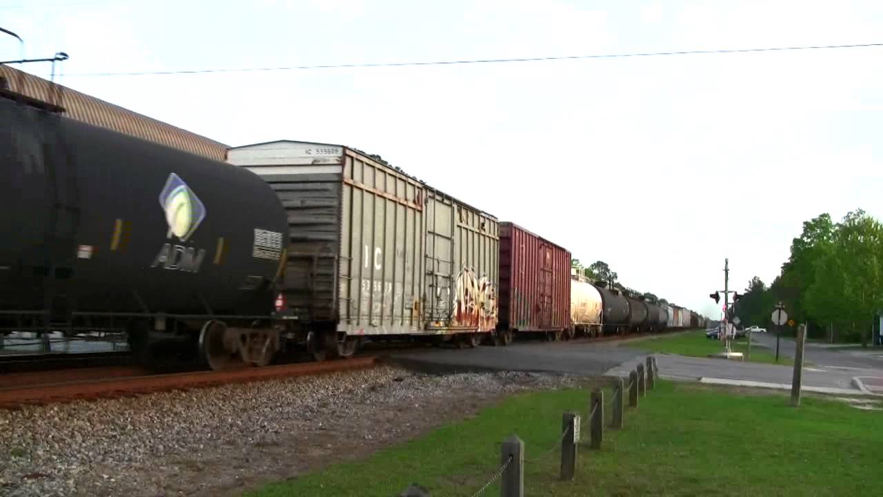Q455 SB meets Amtrak P052 NB CSXT Nahunta Sub. M.P