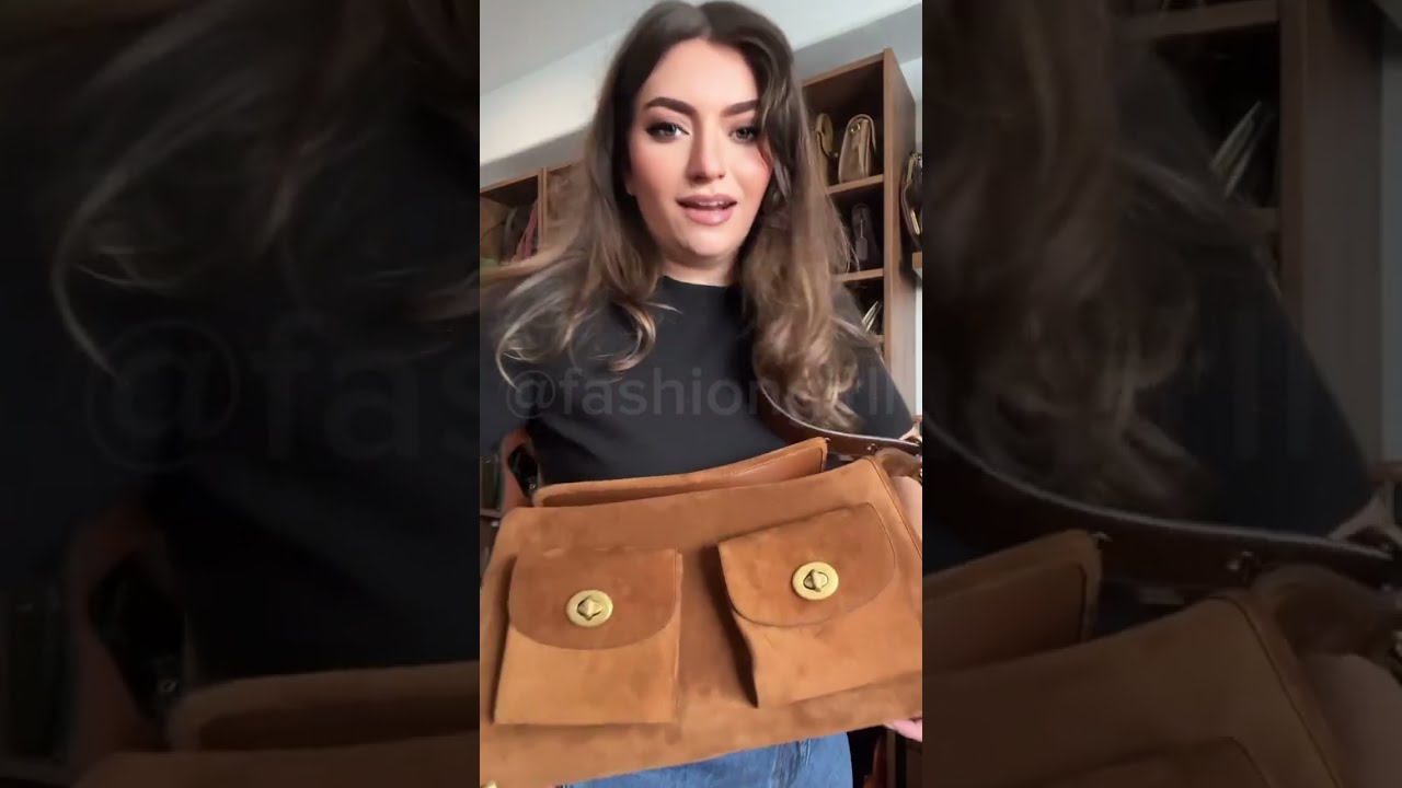 Сумка-рюкзак Coach с поворотным замком. Описание, отзывы о сумке.