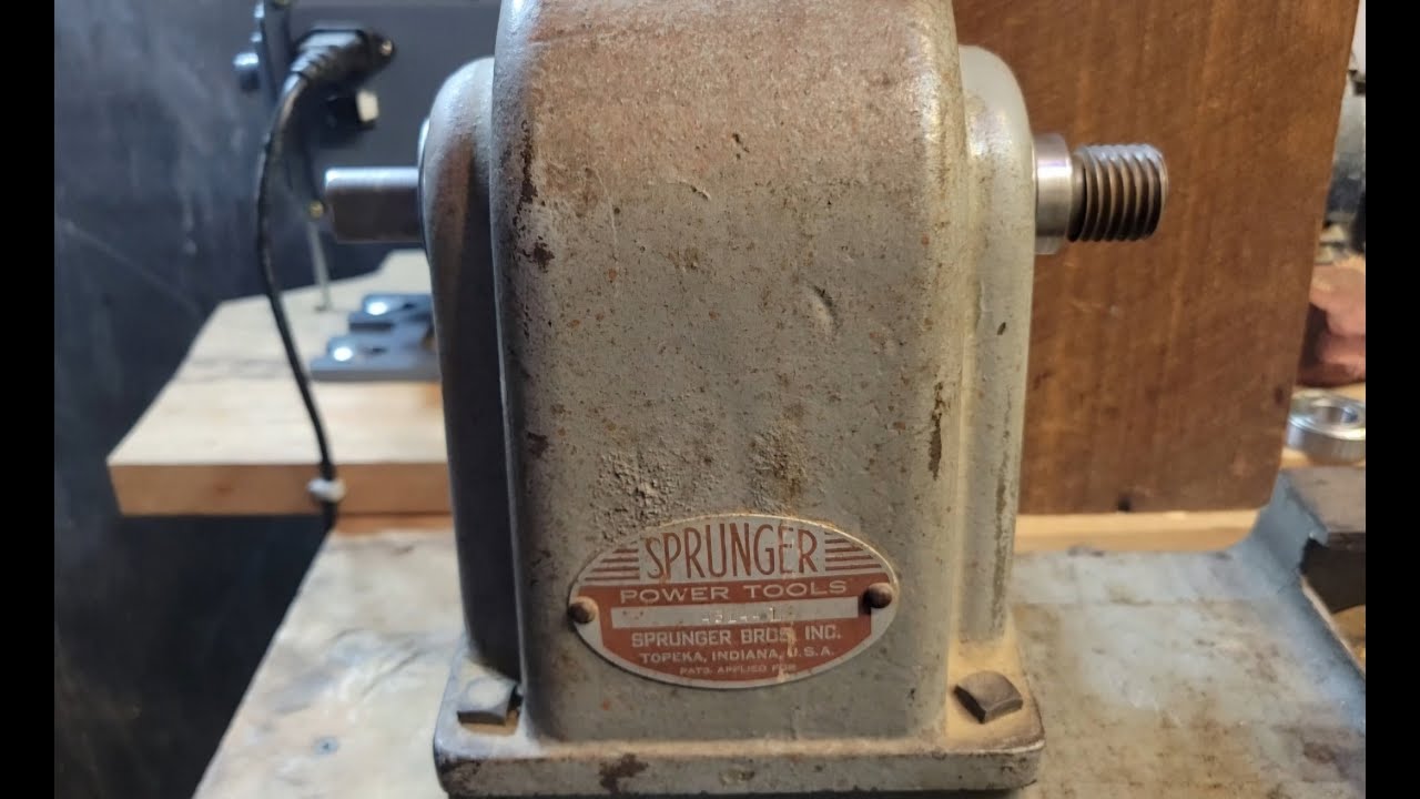 How to replace the bearings and belt on a 1962 Sprunger Brothers Inc. wood lathe.