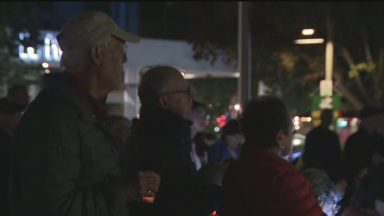 People gathered outside Palo Alto City Hall to call for peace amid the Israel-Hamas war.