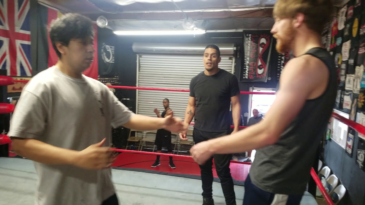 Coach Kaos working with the beginners on their hiptosses