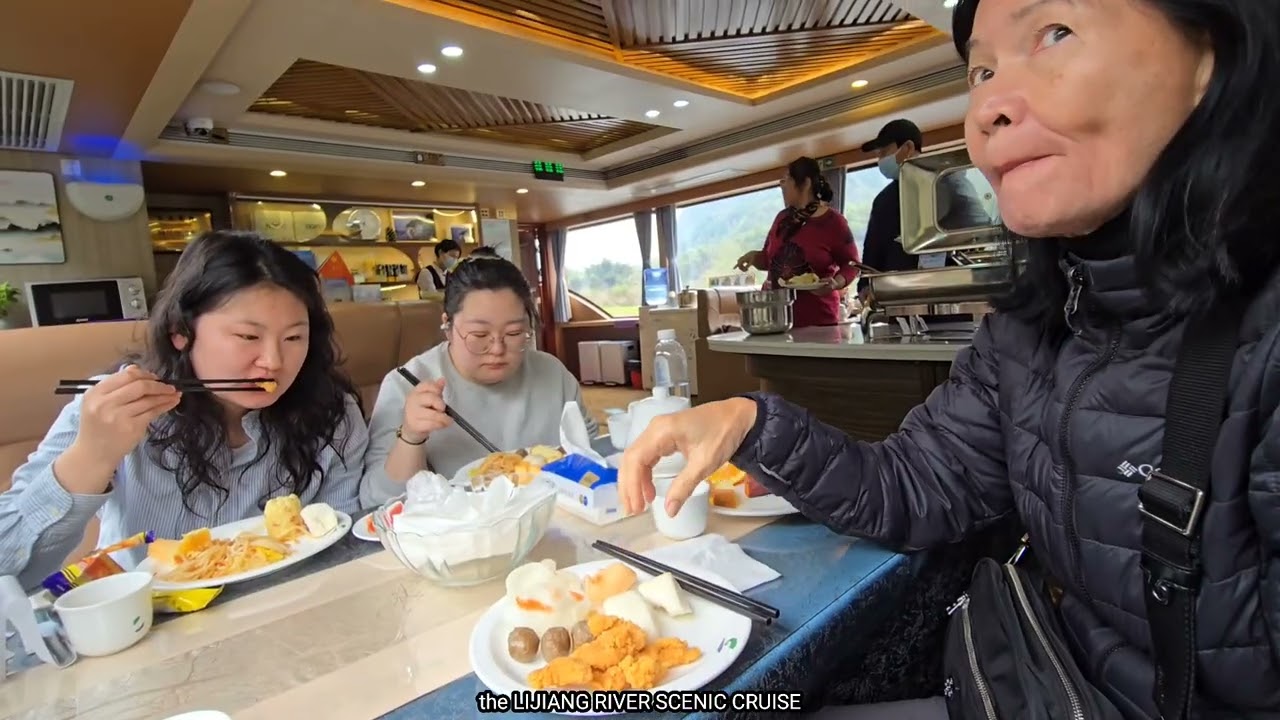 LIJIANG RIVER SCENIC CRUISE with lunch and a visit to the walking street known as WEST STREET.