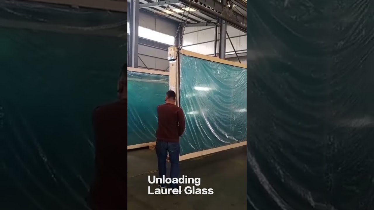 How to load and unload the glass panels from container?