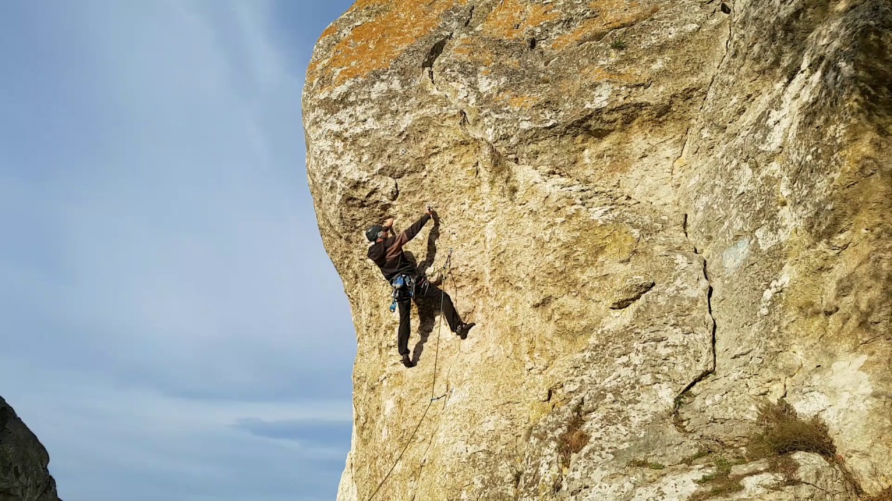 Rock climbing in Cheile Dobrogei, Romania. Route GangBang, grade 7+