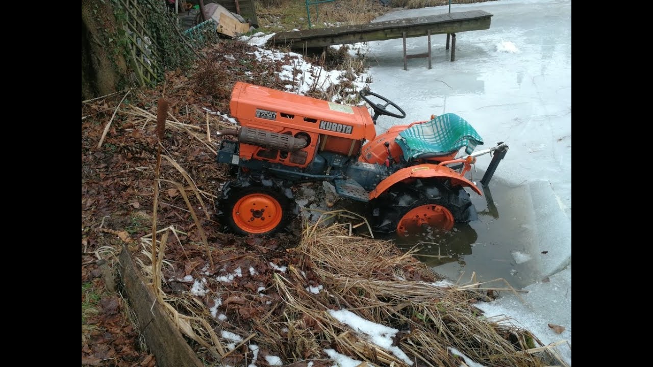 Lodowa wtopa traktorkiem japońskim kubota 7001 na stawie ojca.
