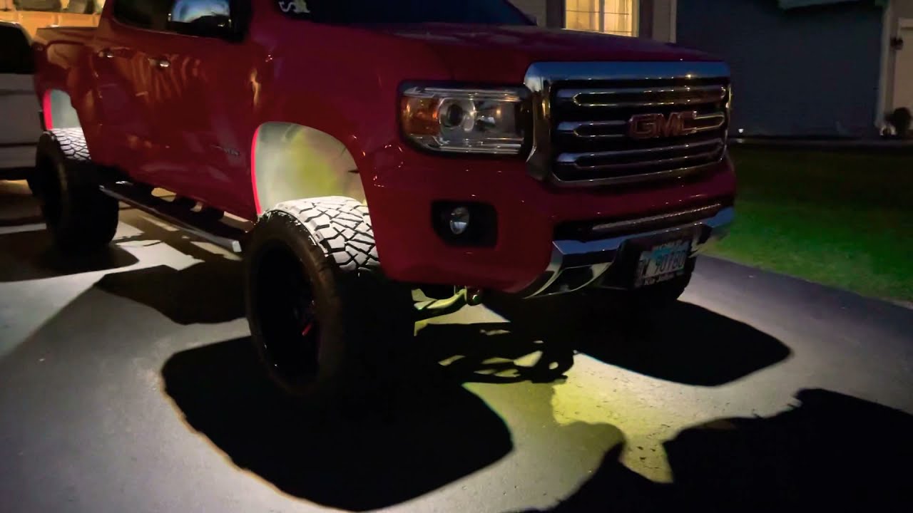 2016 lifted GMC Canyon with black label rock lights 20x12 -44 offset 33x12.5 nitto ridge grapplers