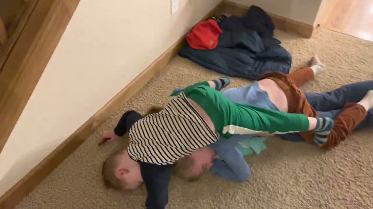 Three boys wrestling, every night before bed