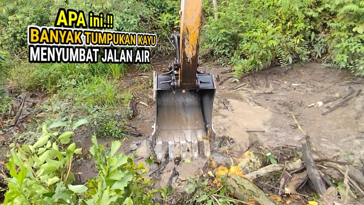 Ternyata ini biang kerok yang membuat air dalam parit tidak mengalir