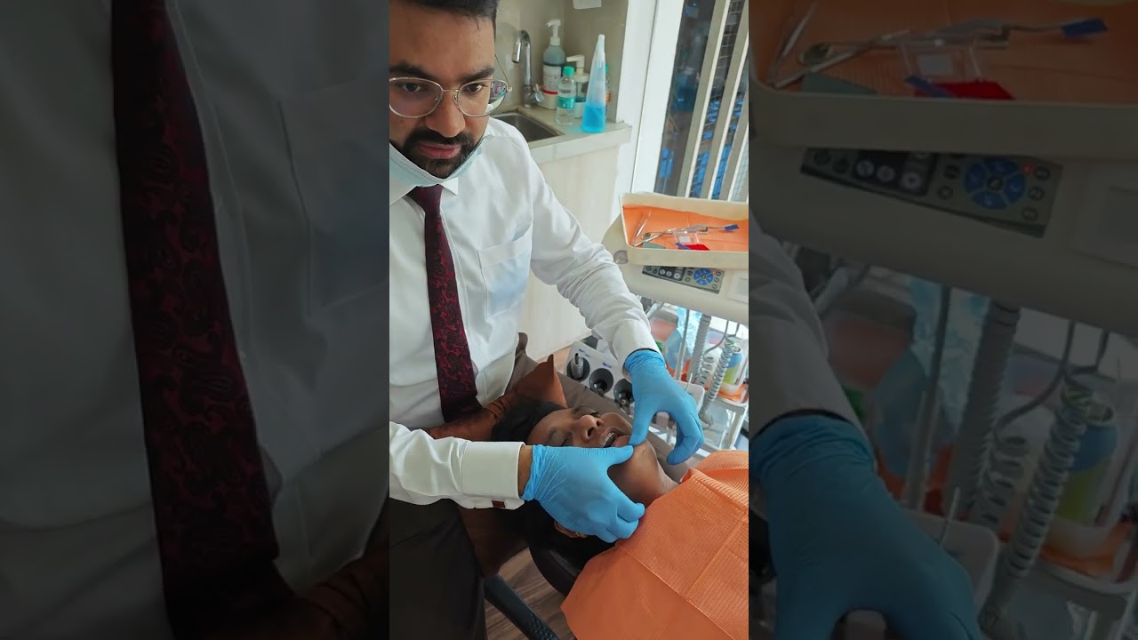 Taking a centric bite on kois deprogrammer for full mouth rehab. Dr vishwas madan
