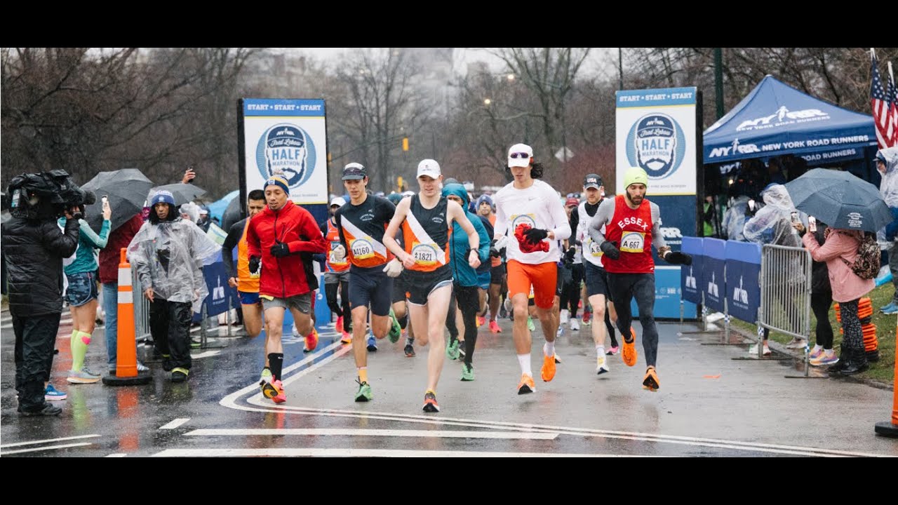 Crazy A** Runners in the Rain at the Fred Lebow Half Marathon in Central Park NYC