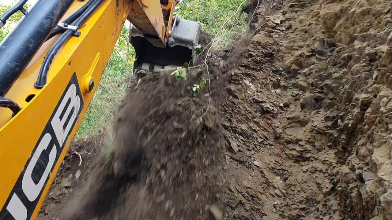 JCB Backhoe-Cutting Stony Hill for New Track-Inside the Cabin